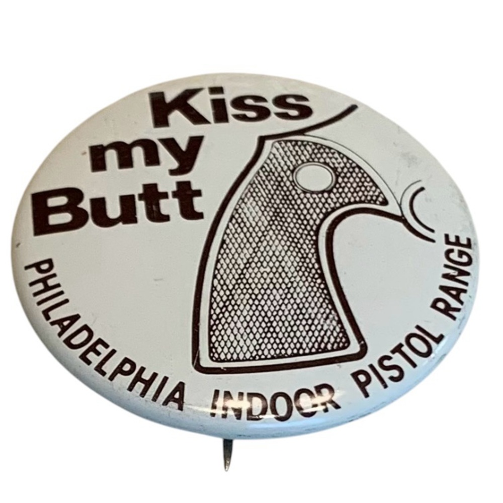 VINTAGE PIN 1970”s PHILADELPHIA INDOOR PISTOL RANGE “KISS MY BUTT” PIN RARE